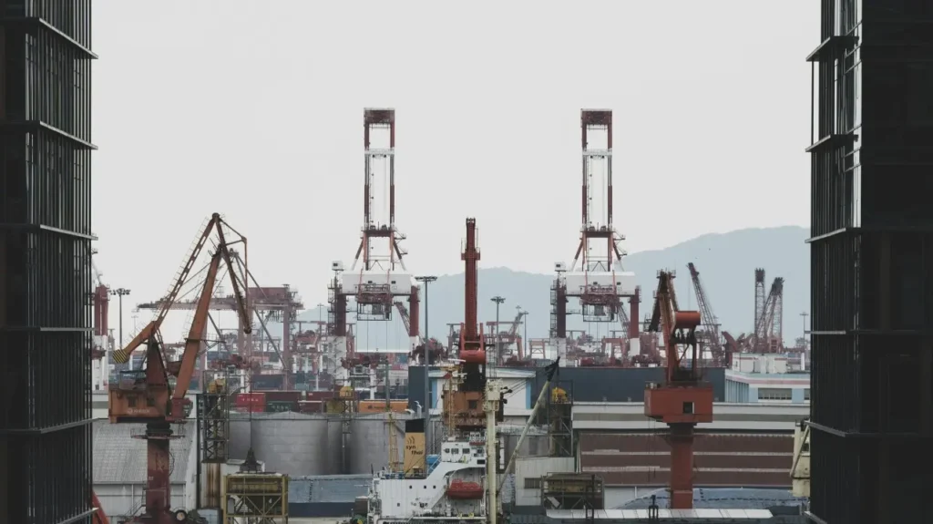 Container cranes at a busy port