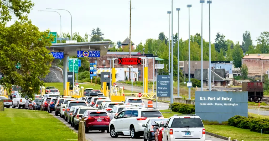 Commercial trucks entering the United States through a border crossing with Canada following the first use of Section 338 tariff authority.